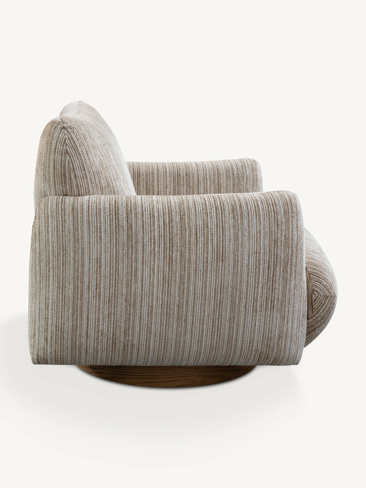 A modern swivel armchair upholstered in a textured beige and gray vertically striped fabric, shown from a three-quarters angle on a light cream background.