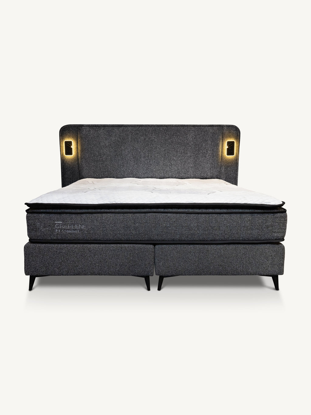 A modern platform bed with a dark gray upholstered headboard and footboard, featuring integrated warm LED light panels on either side of the headboard and a white mattress on top, shown against a plain off-white background.