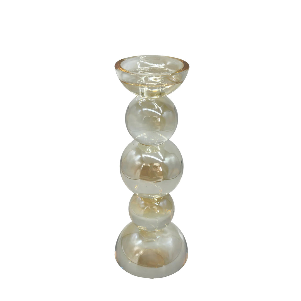 A clear glass pedestal candle holder with a stacked, rounded column design and a shallow bowl on top, shown against a plain white background.