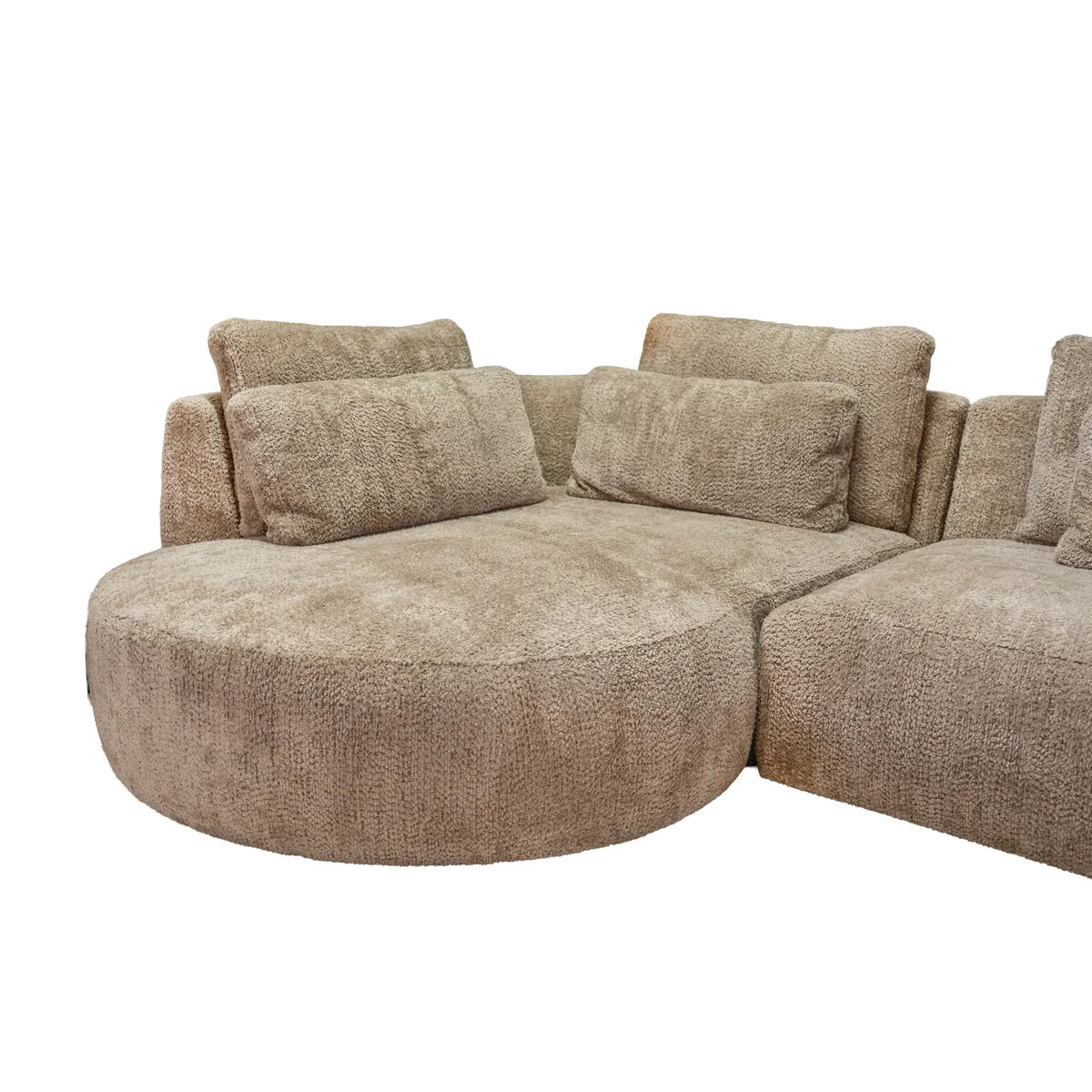 A modern curved modular sectional sofa upholstered in a textured bouclé fabric in a warm taupe-beige color, shown against a plain white background.