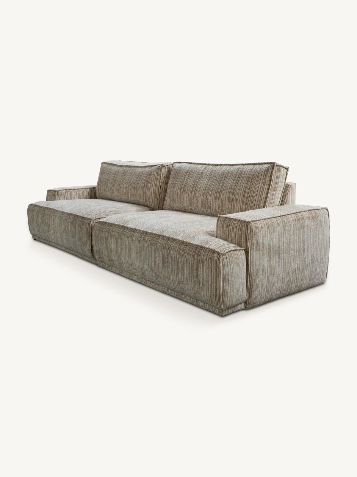A modern low-profile modular sofa upholstered in a textured, heathered taupe-beige fabric, shown from a three-quarters angle against a solid off-white background.