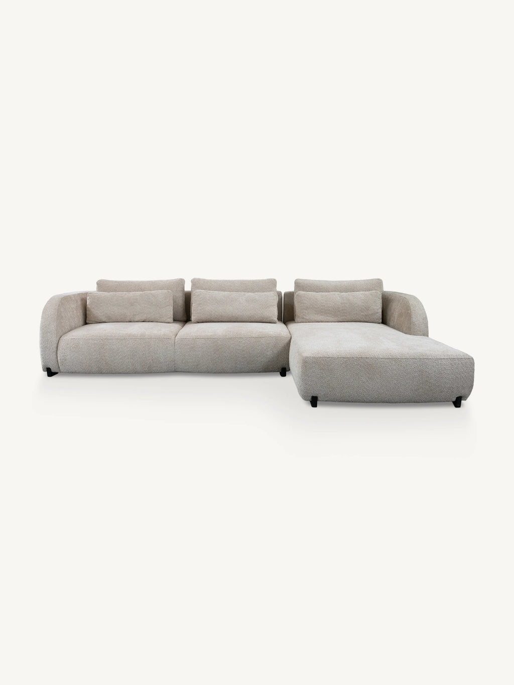 A modern sectional sofa with a right-facing chaise lounge, upholstered in a light beige textured fabric, shown against a plain off-white background.